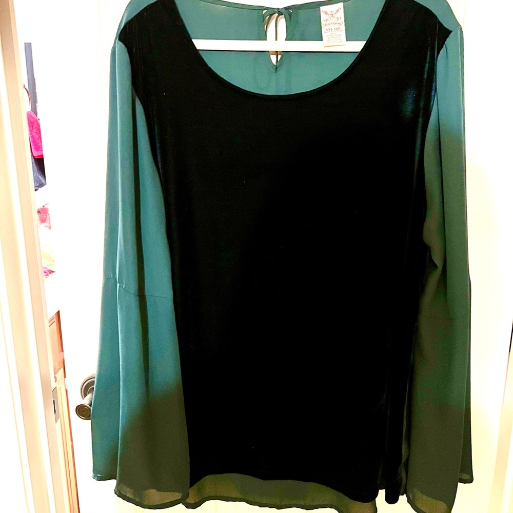 Long sleeve Hunter green velvet front top with bell sleeves. NWOT.